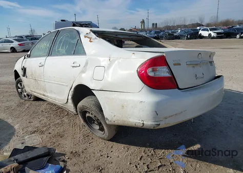 2003 Toyota Camry Le z USA, uszkodzony, nr VIN JTDBE32K930195126